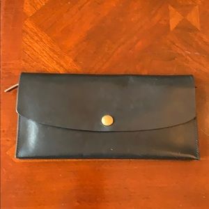 Black leather passport holder and wallet